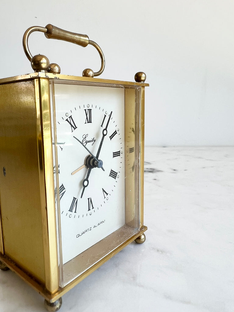 Vintage Equity Brass Clock