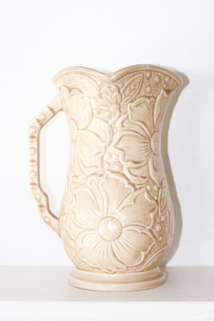 Peach ceramic floral pitcher